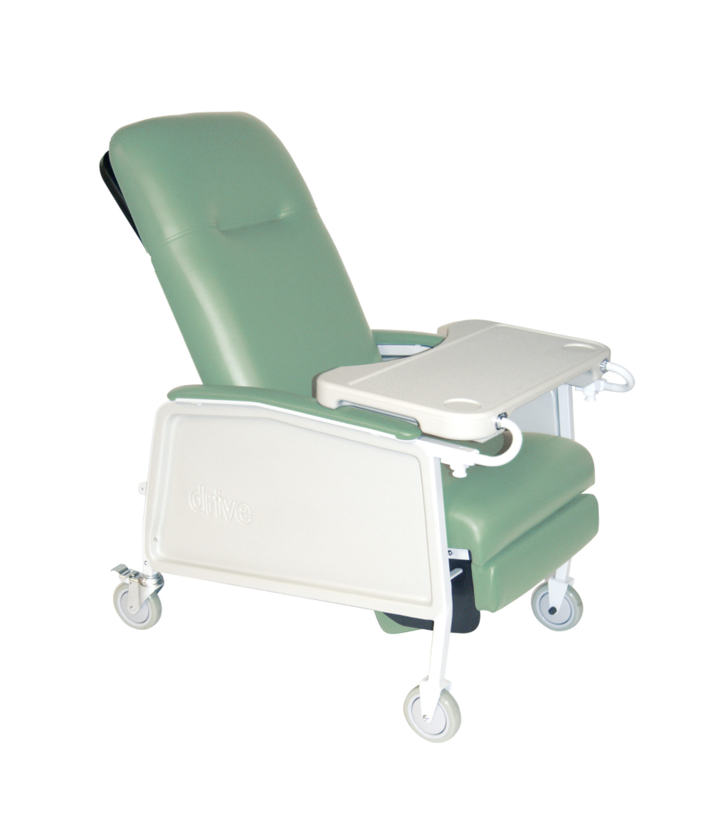 Green medical chair with a tray on a white background