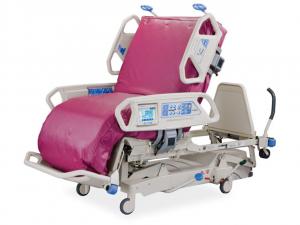 HillRomtotalcaresport2 Hospital bed with pink mattress on a white background