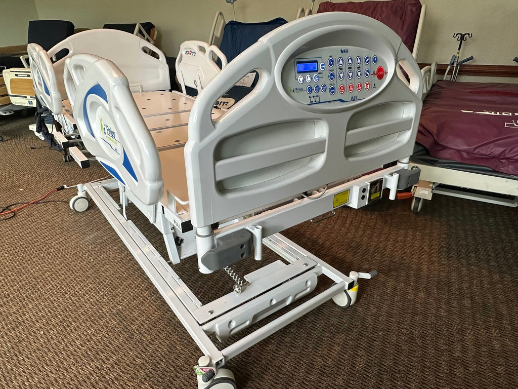 Prius Ai1 bariatric hospital bed with extra-wide high-low adjustable frame and side rails for patient comfort and safety.