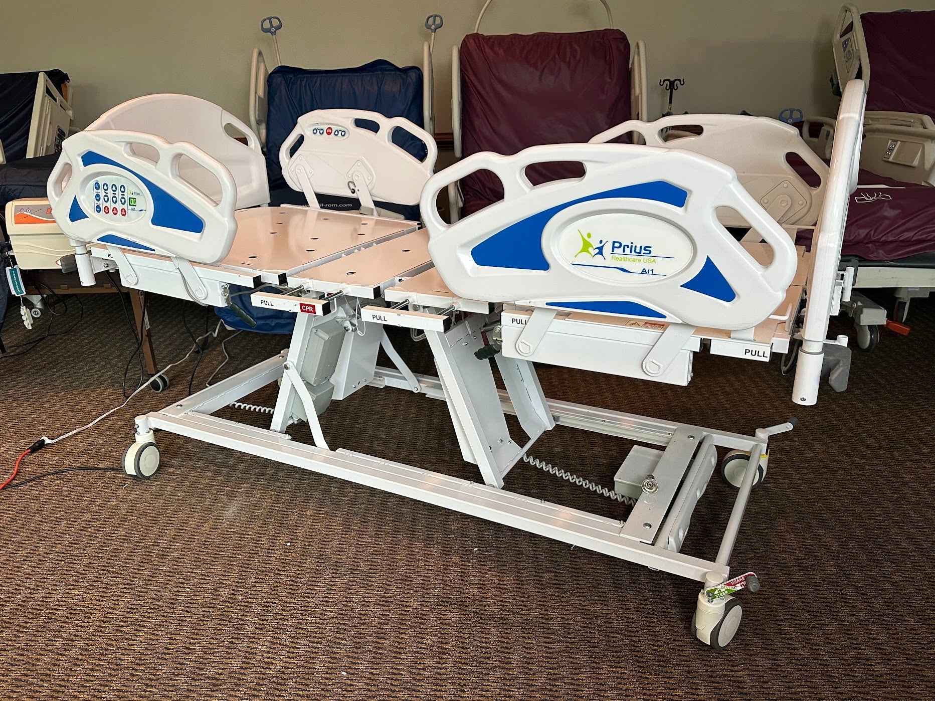 Prius Ai1 bariatric hospital bed with high-low adjustable features and extra-wide design for patient comfort and safety.