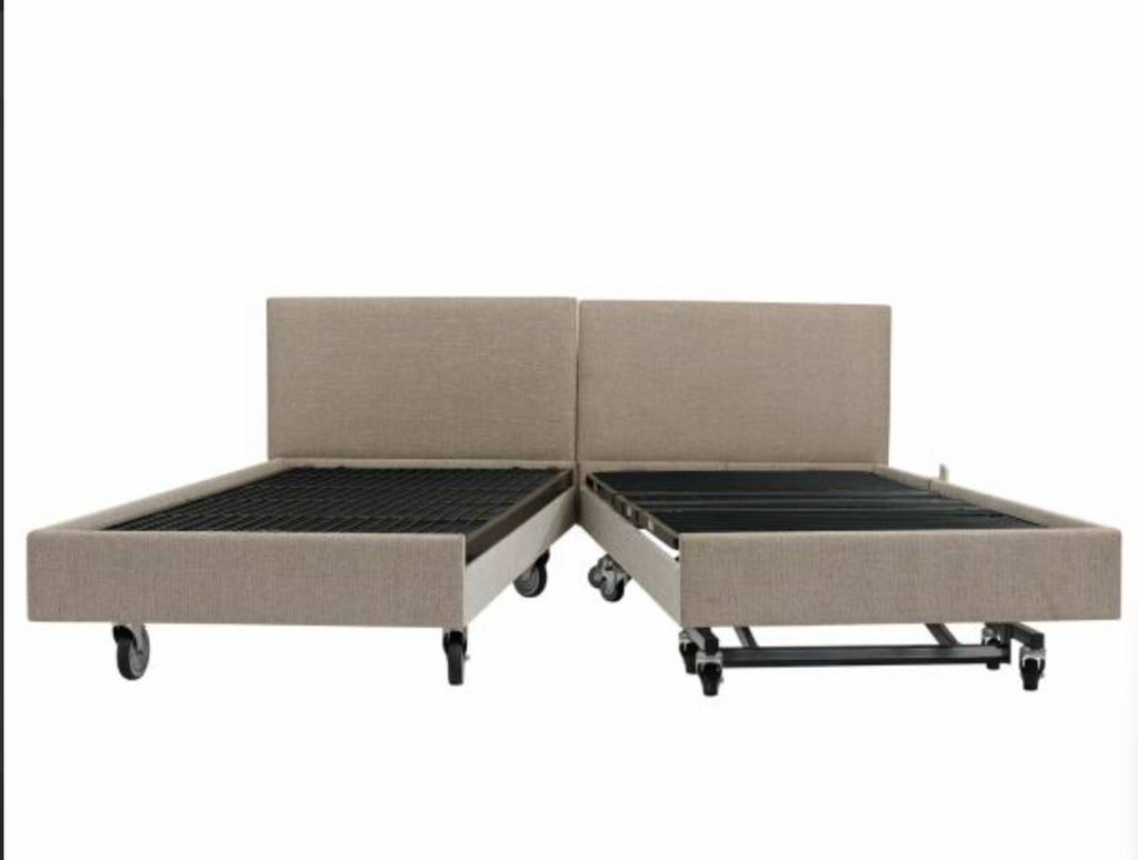 An electric motorized convertible bed frame shown in its unfolded position, featuring beige upholstered side rails and headboard with black slatted metal bedsides and wheels on a white background.